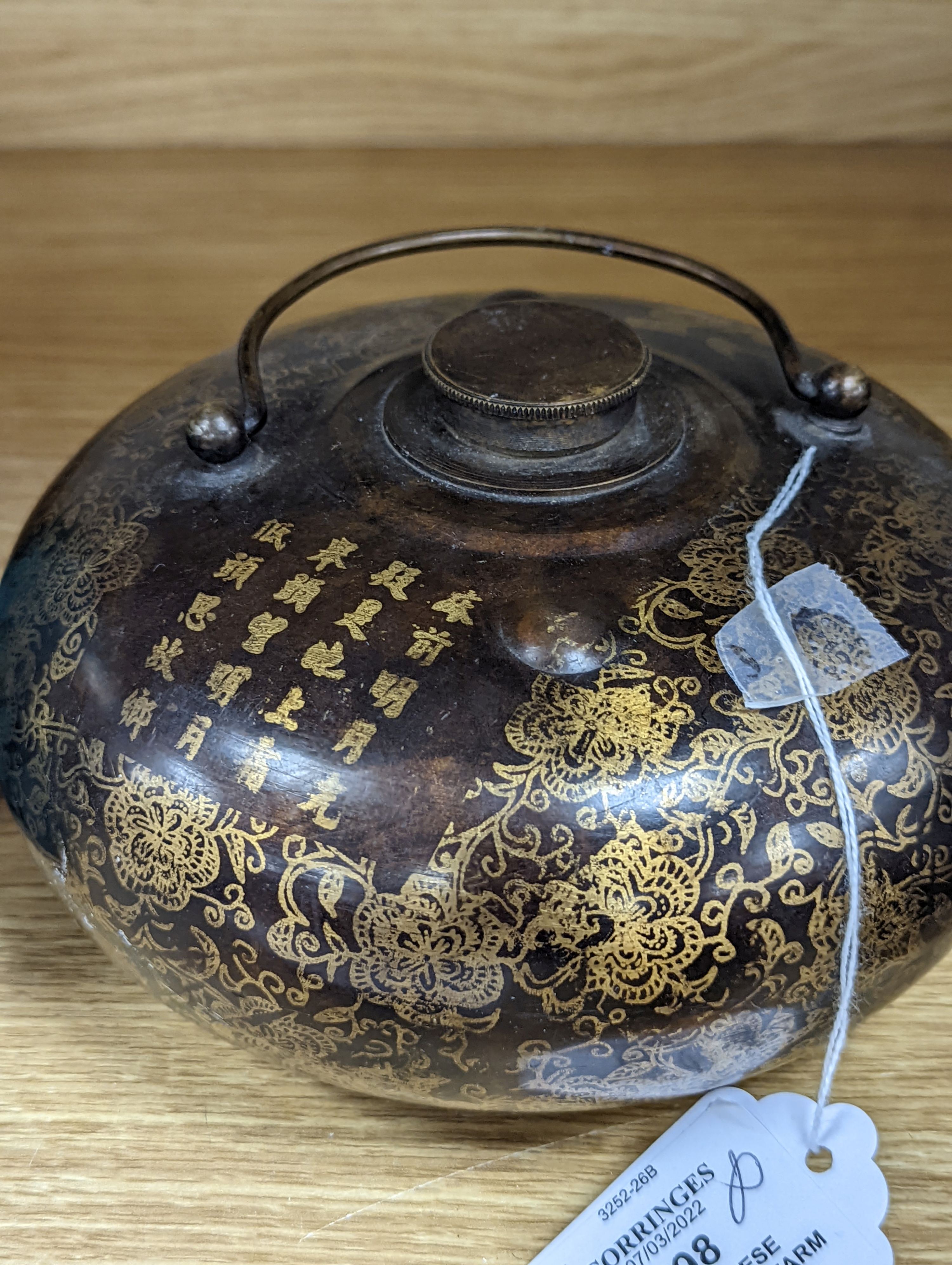 Two Chinese bronze handwarmers and a turquoise glazed jar